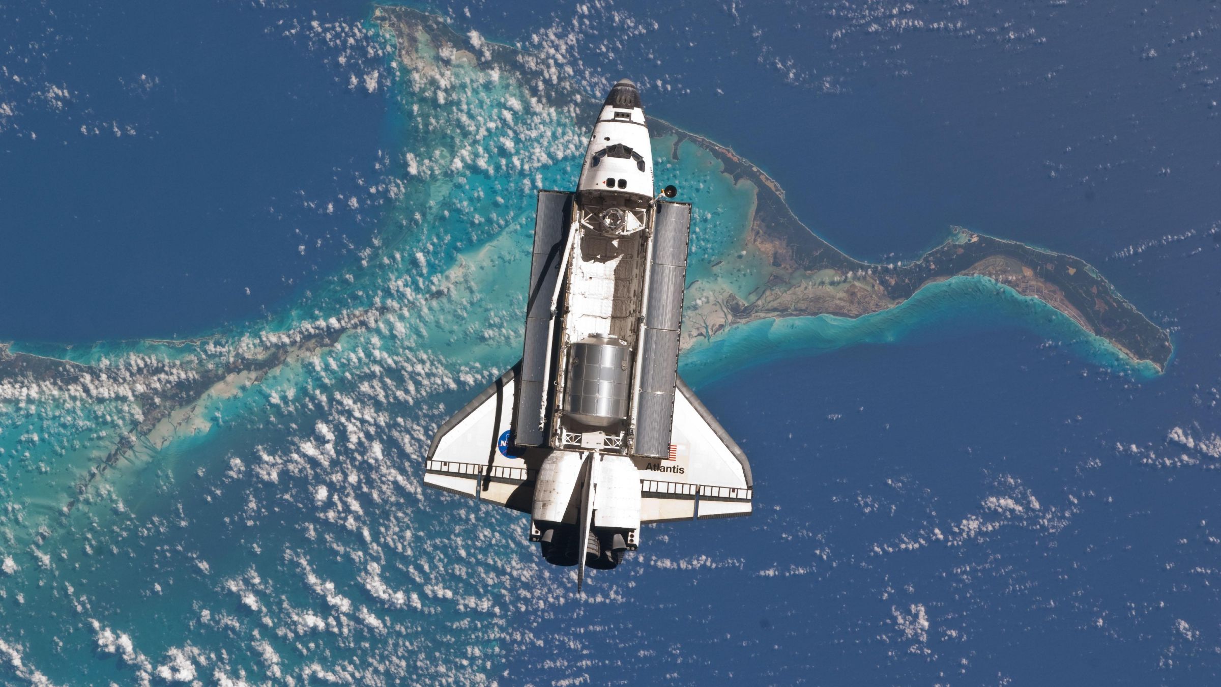 Space Shuttle Atlantis: Permanently Photobombing Earth 15 Years Ago