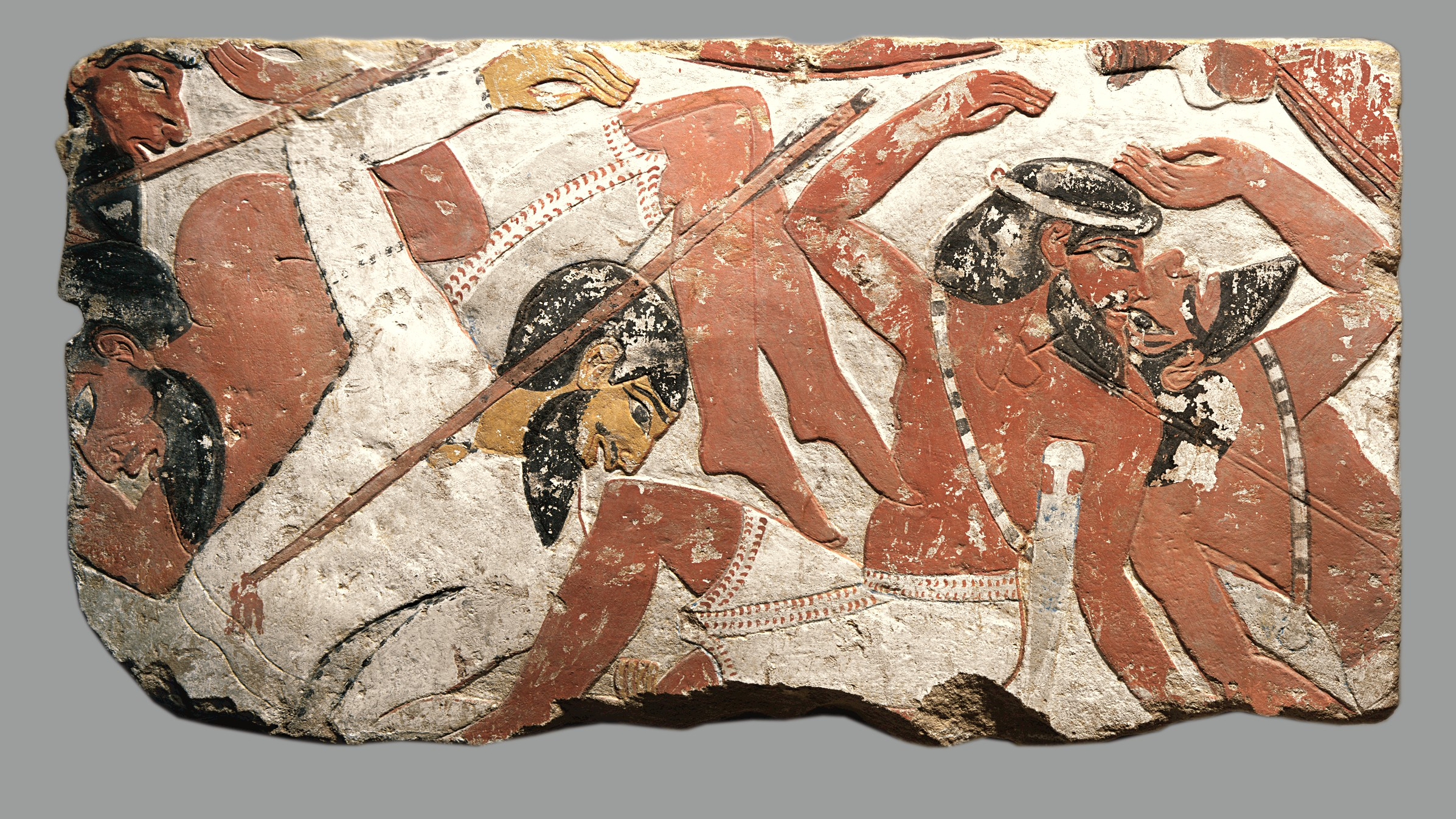 Relief Fragment with Vanquished Enemies: A Glimpse into Ancient Egyptian Warfare